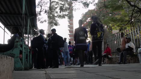 A-short-time-lapse-of-a-busy-pavement-at-the-City-Hall-bus-terminus-in-Bulawayo,-Zimbabwe